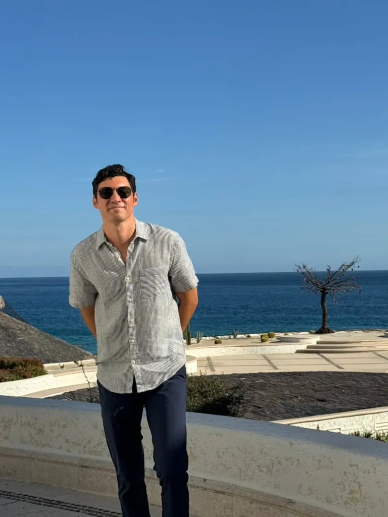 Ari Westwood standing above the Los Cabos coastline